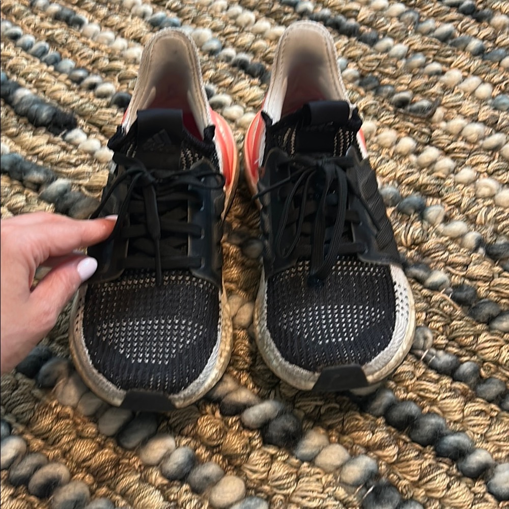 Adidas ultraboost Black and White Athletic Sneakers with pink detail